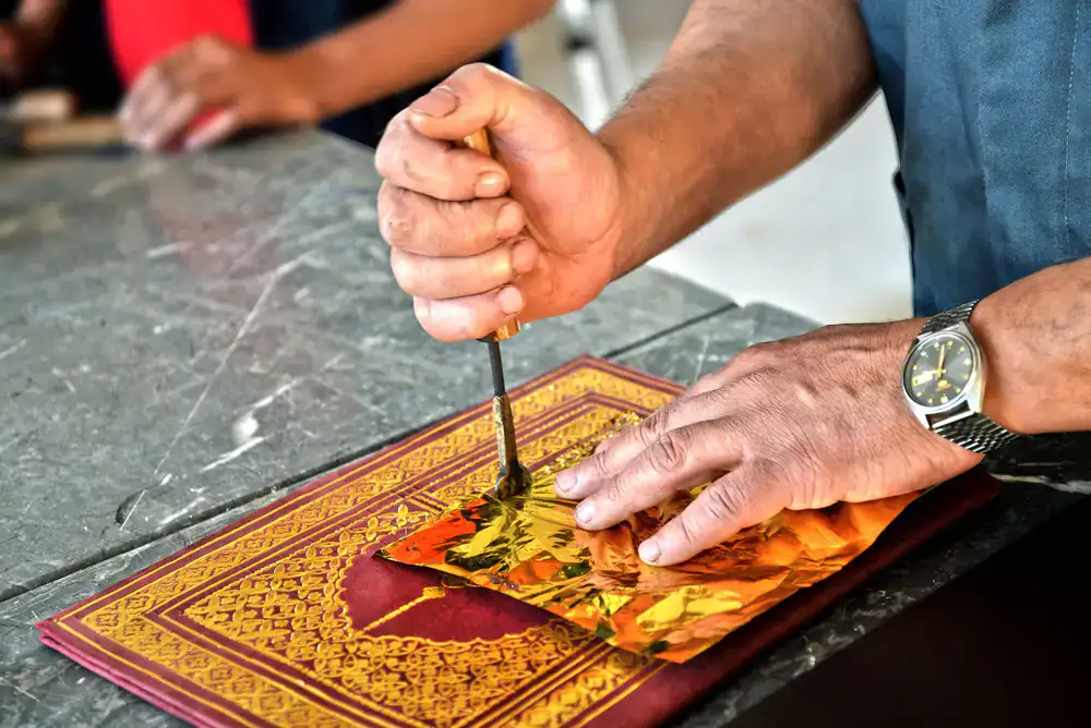 Intricate gold leaf illumination details