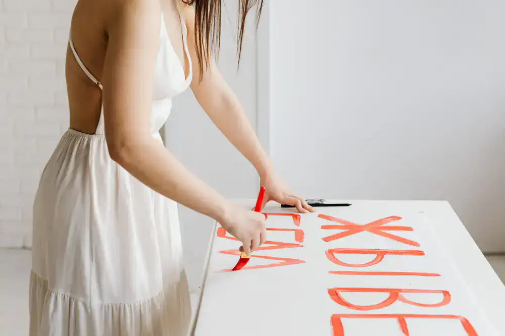 Fluid modern brush lettering on event signage